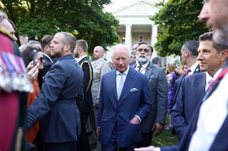 King Charles at a tea party at the British Embassy